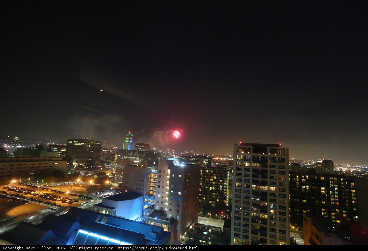 Fireworks illuminate the city skyline