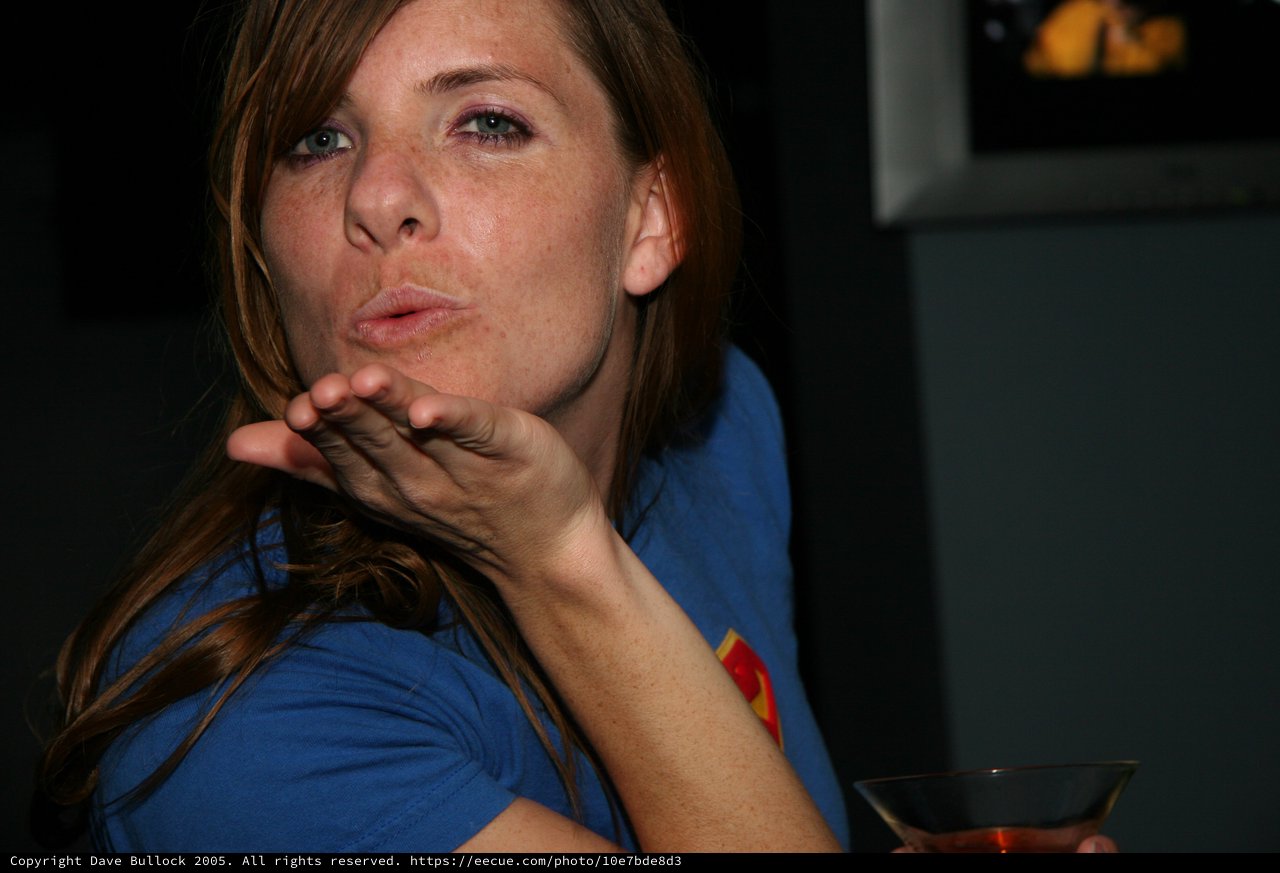 Penelope Blowing a Playful Kiss at Party