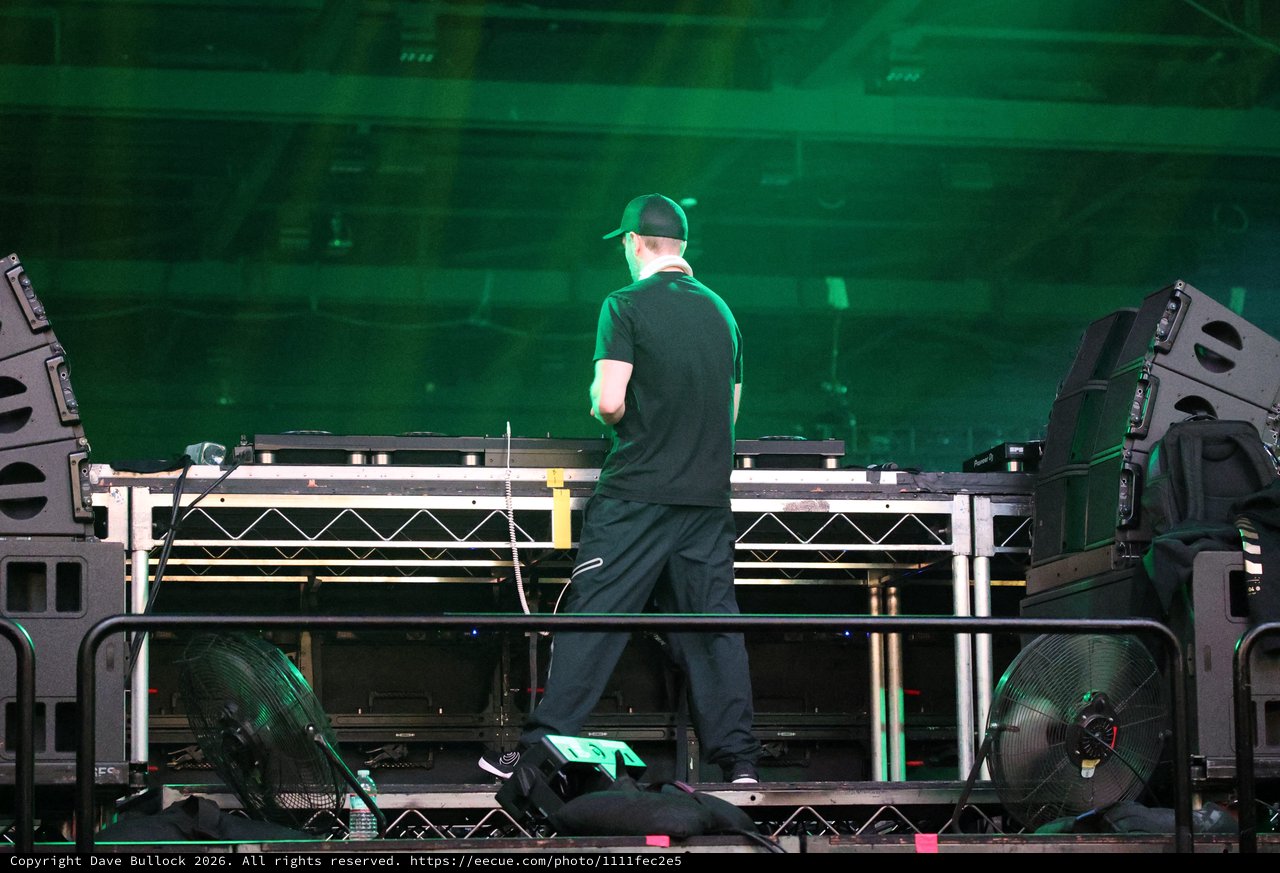 DJ Performs Under Green Lights at Wobbleland Festival