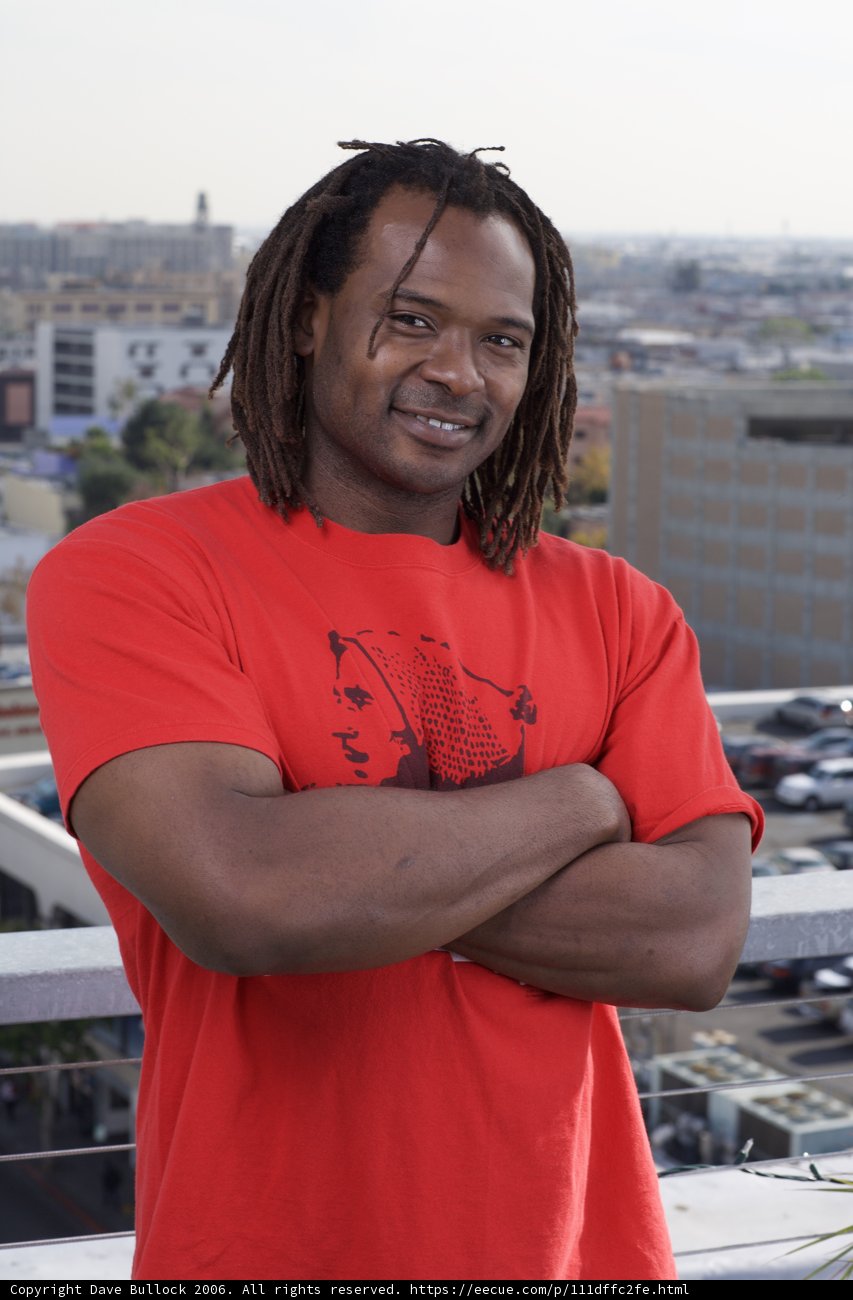 Happy Man in T-Shirt with Dreadlocks