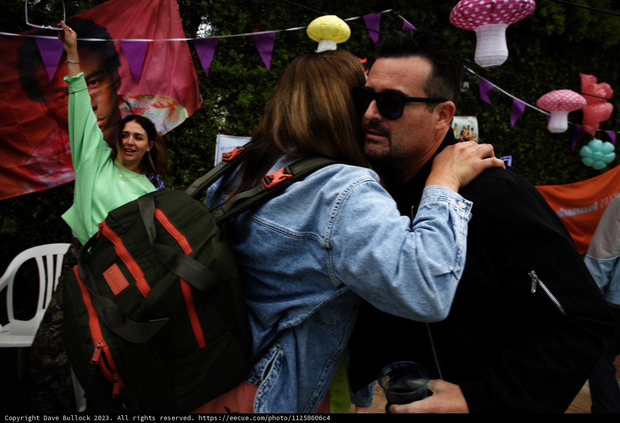 Joyful Embrace at Cam's Grad Party