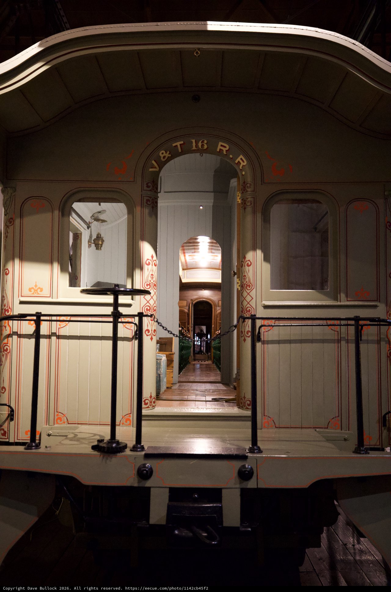 Historic Railway Car Interior with Ornate Decorative Detailing