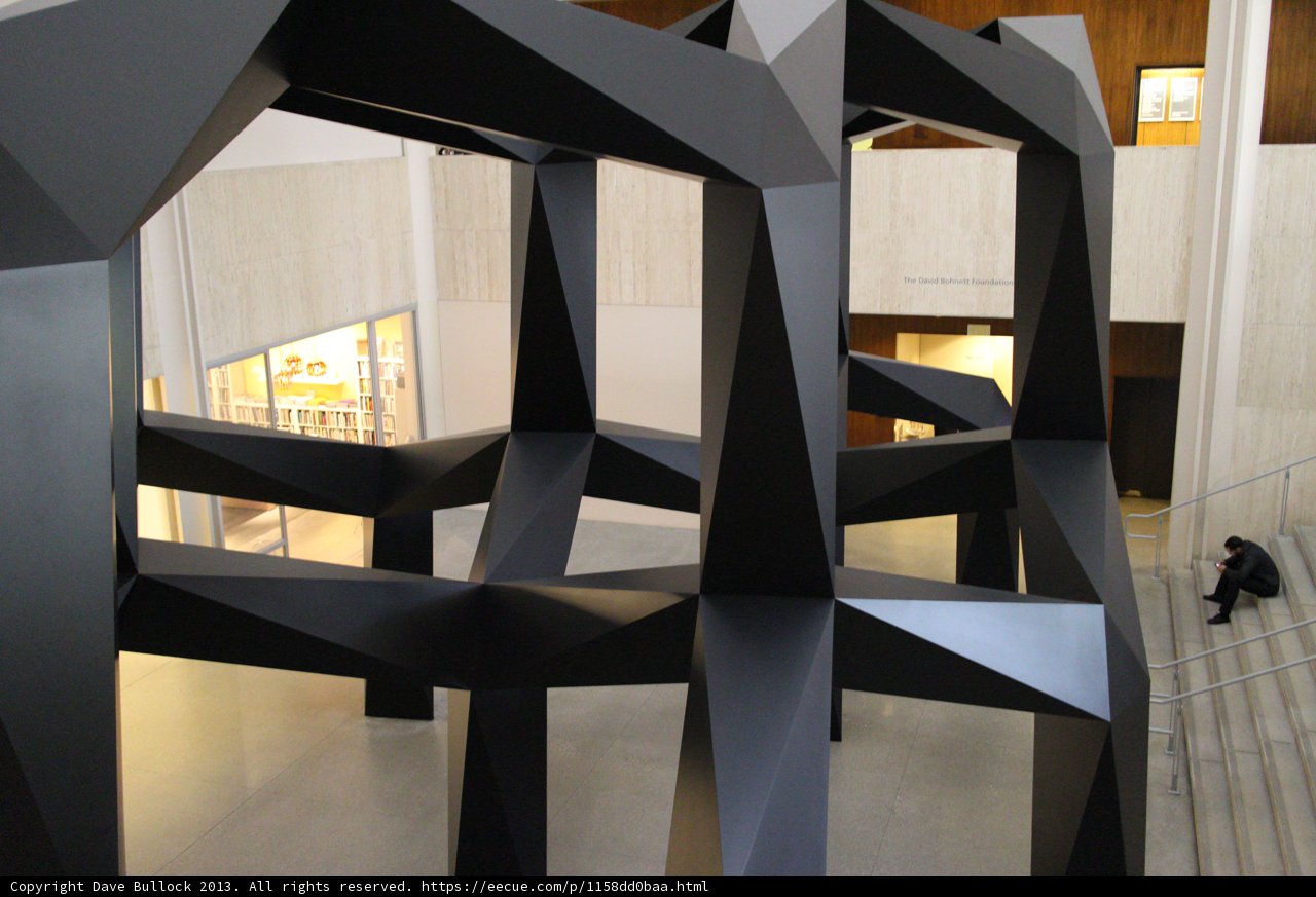 Sleek Plywood Sculpture Enhances Modern Interior Design