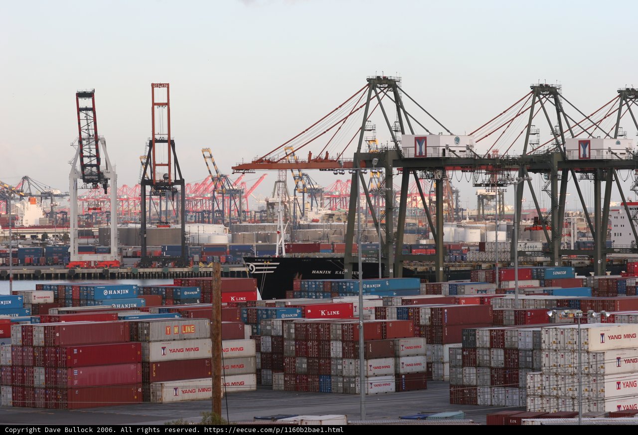 Towering Cargo Containers at the Waterfront