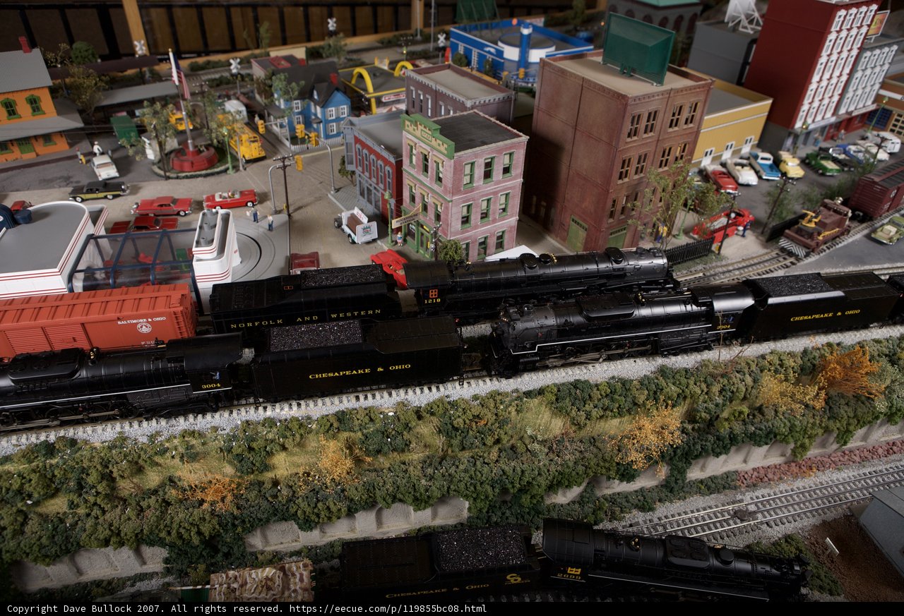 Toy Train in a Miniature Metropolis