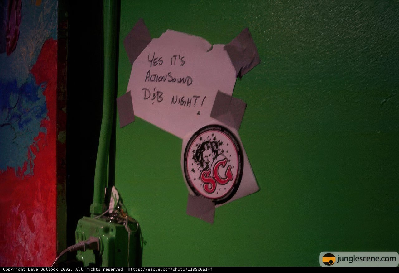 The Cross-Eyed Cat Caption: A quirky message scrawled on a wall featuring a cute cat doodle with a sticker eye patch.