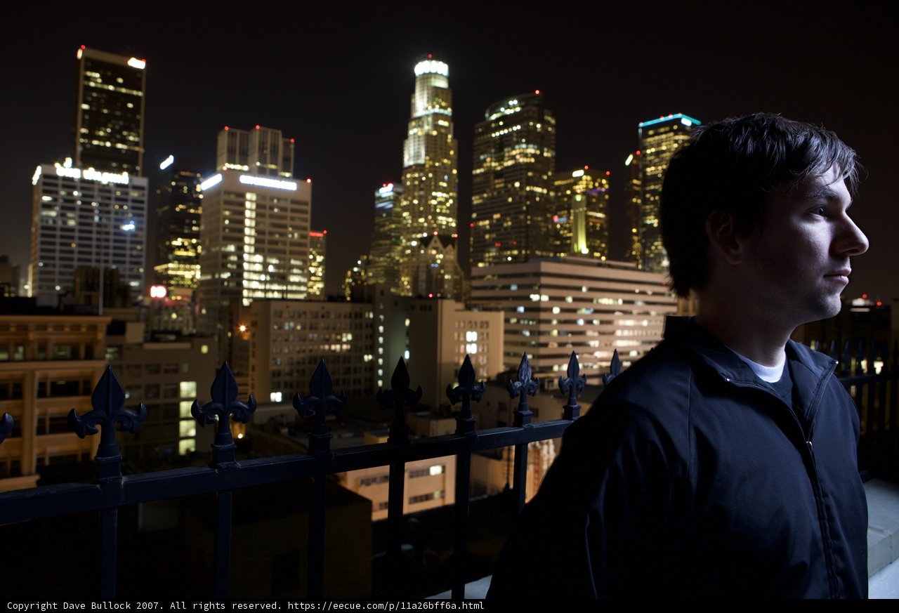 Skyline Reflections: A Man Contemplates Life in the Metropolis