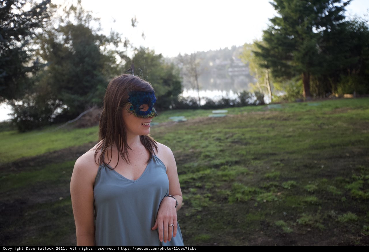 Masked Woman by the Lake at Twilight