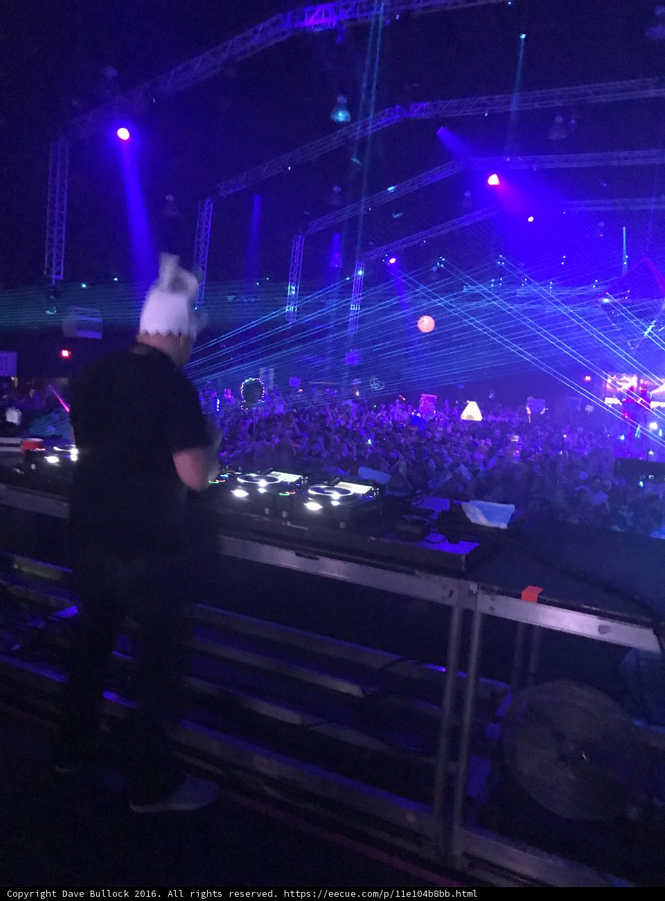 Hat-wearing Musician Lights up Night Club
