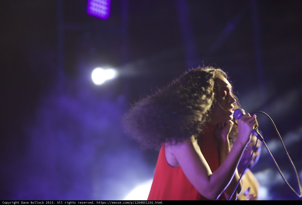 Solange Profile Singing Spotlight Guitarist Background Purple