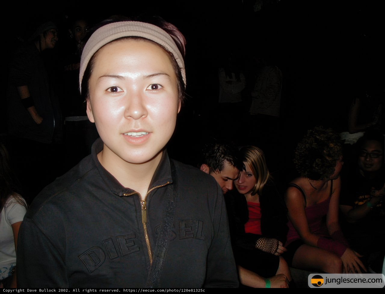 Woman in Black Jacket at Urban Night Club