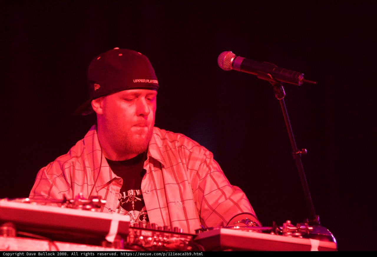 Electrifying Performance by Man in Baseball Cap