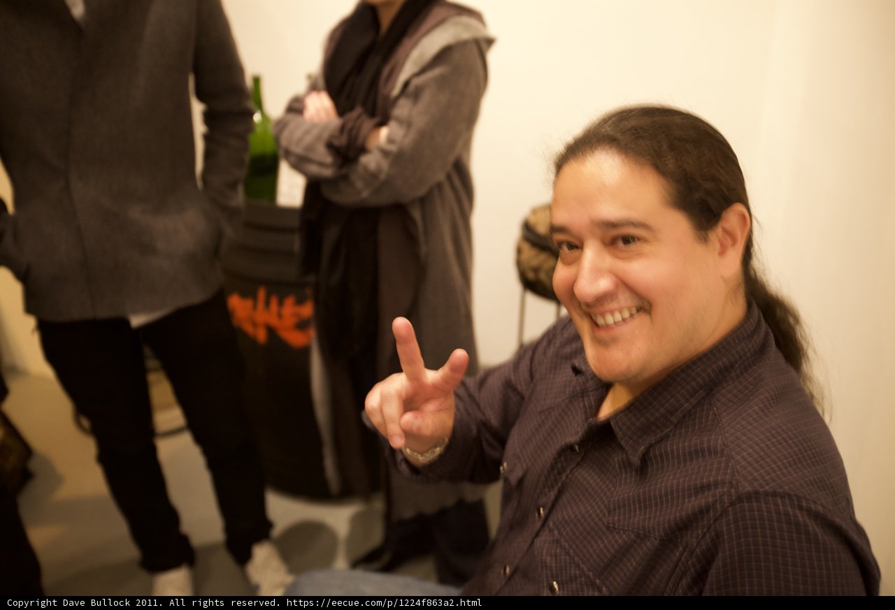 Long Haired Man at Wine Party