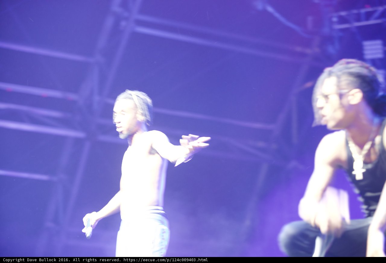 Two Men Rocking the Stage with Microphone