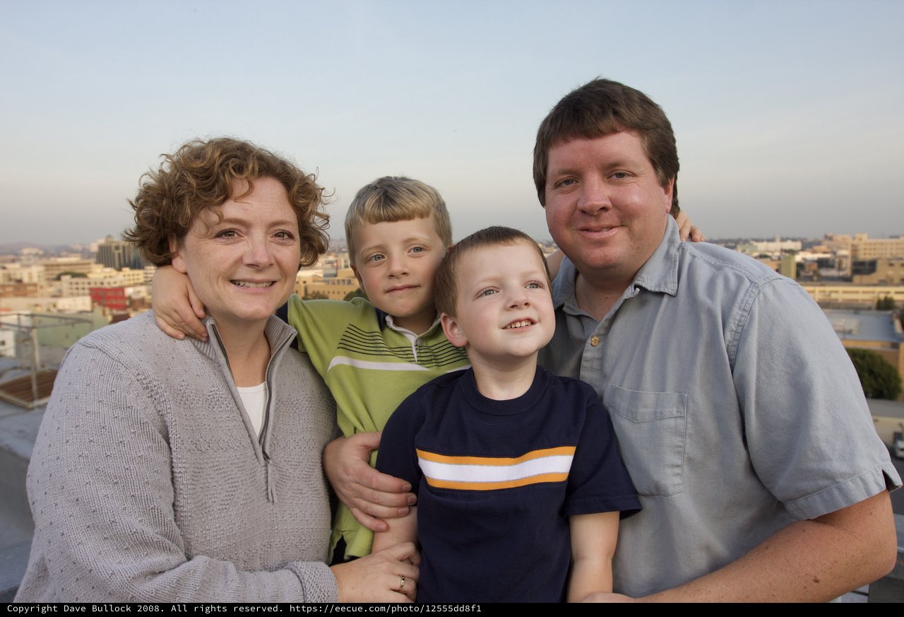 Family Portrait on Rooftop at Dusk