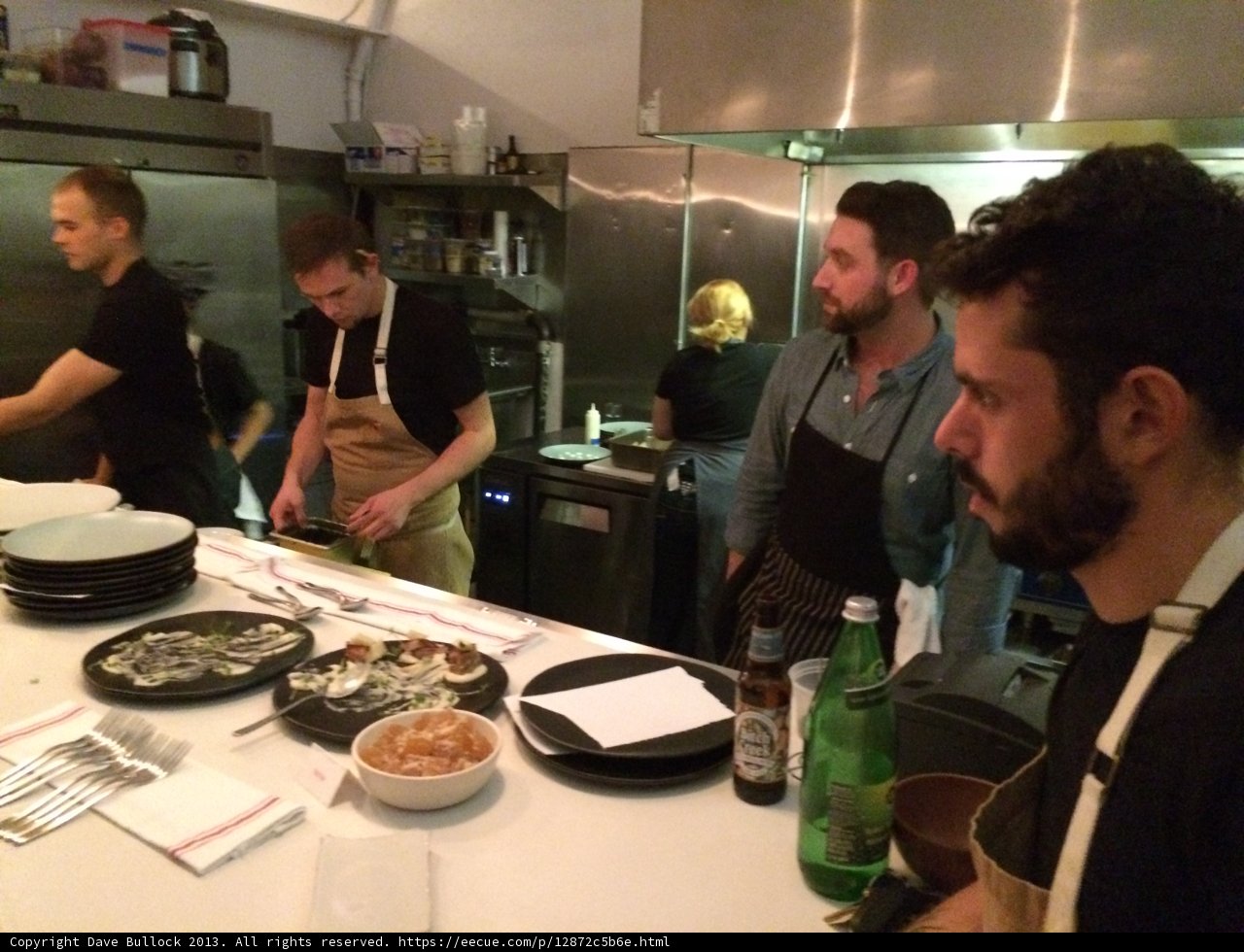 Kitchen teamwork at a bustling LA restaurant