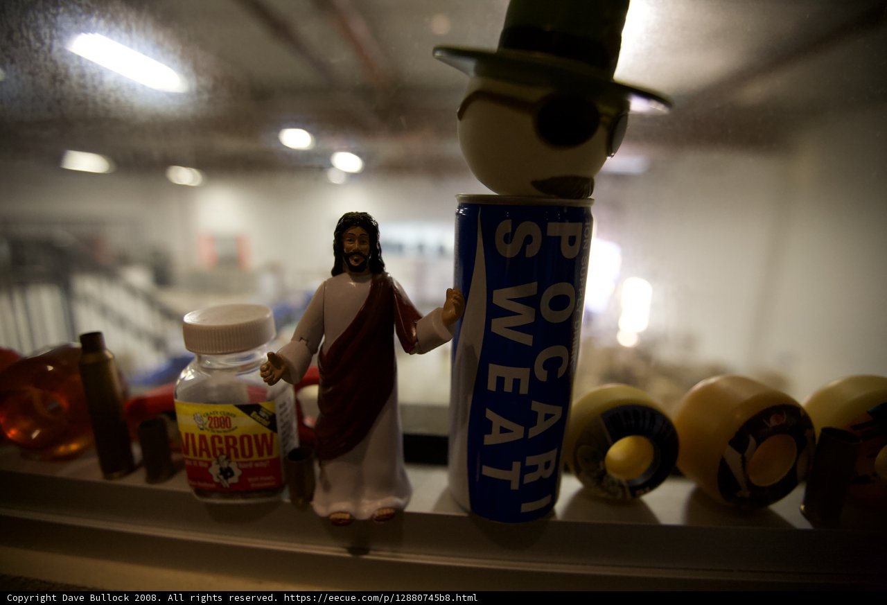 Jesus Figurine Amongst Trinkets and Toys