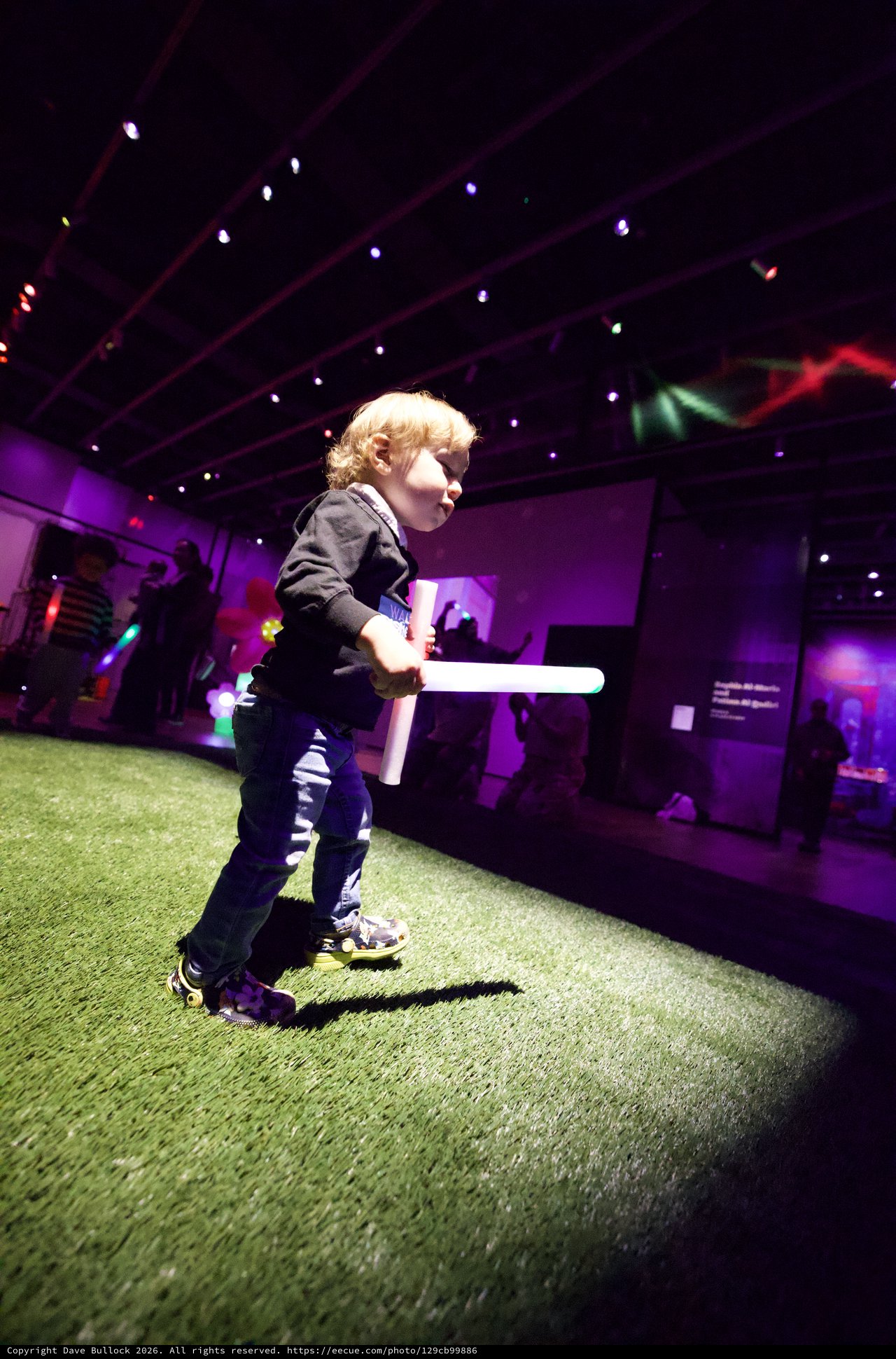 Toddler with Lightsaber at Baby Rave Event