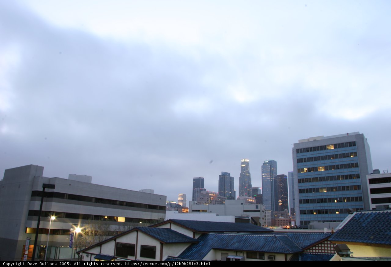 Urban Skyscraper and Cloudy Sky