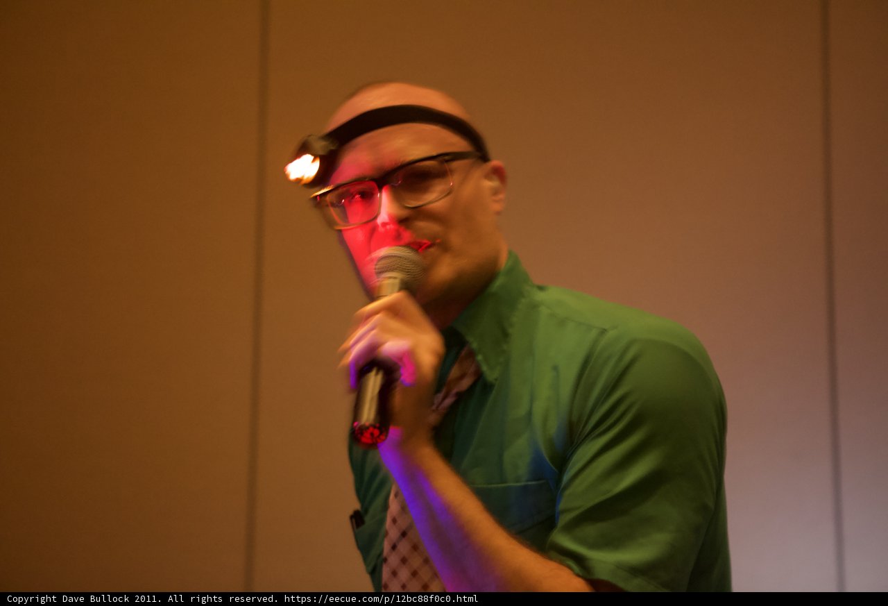 The Entertainer with a Hat and Microphone