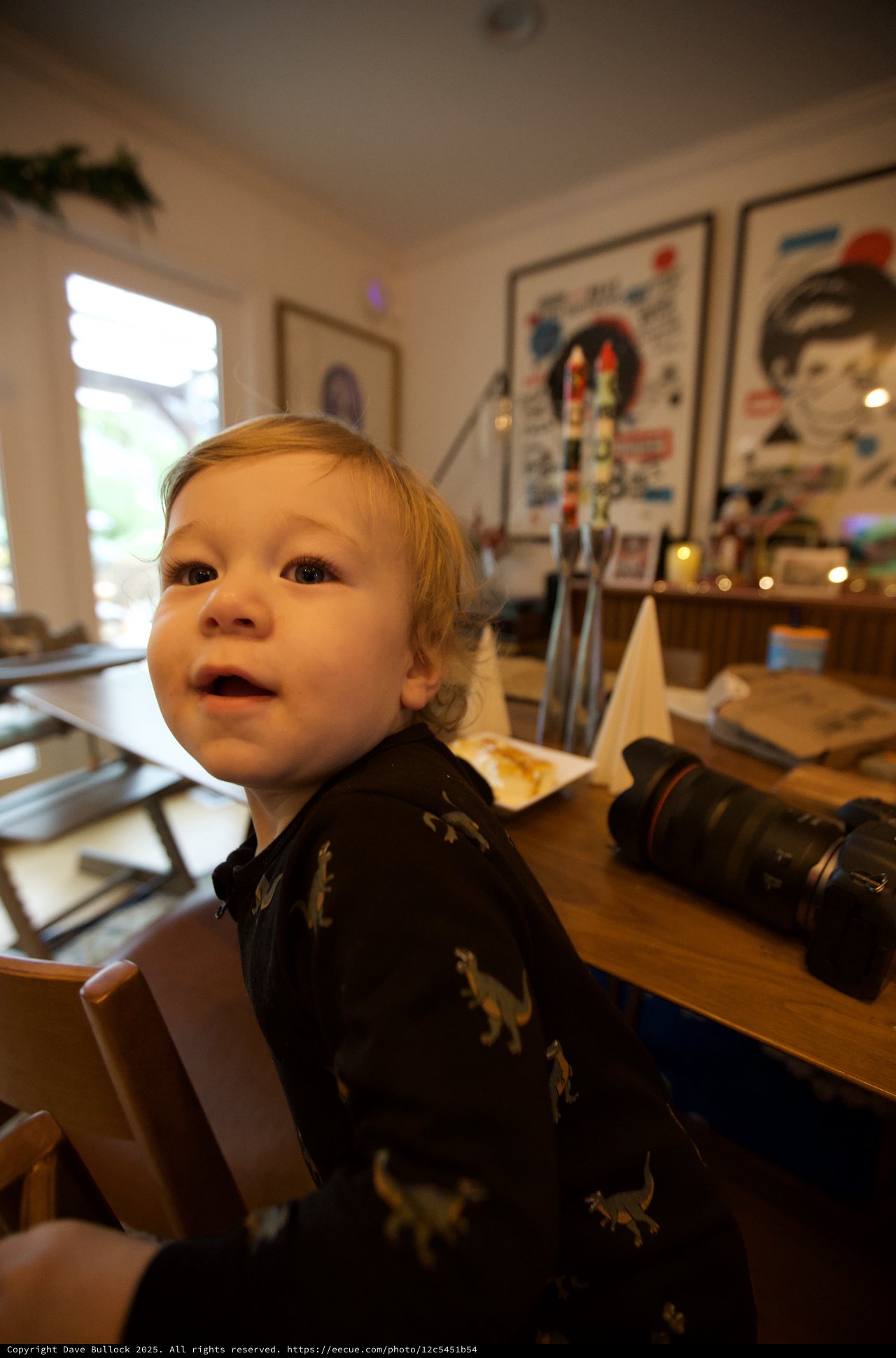 Curious Toddler at Holiday Dinner Table