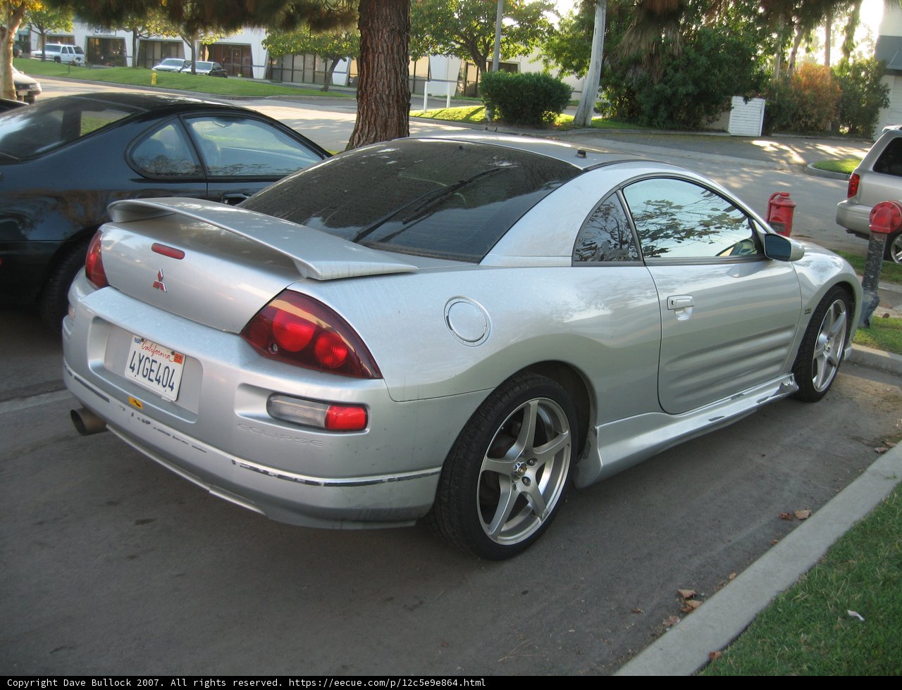Silver Sports Car Parked on the Side of the Road