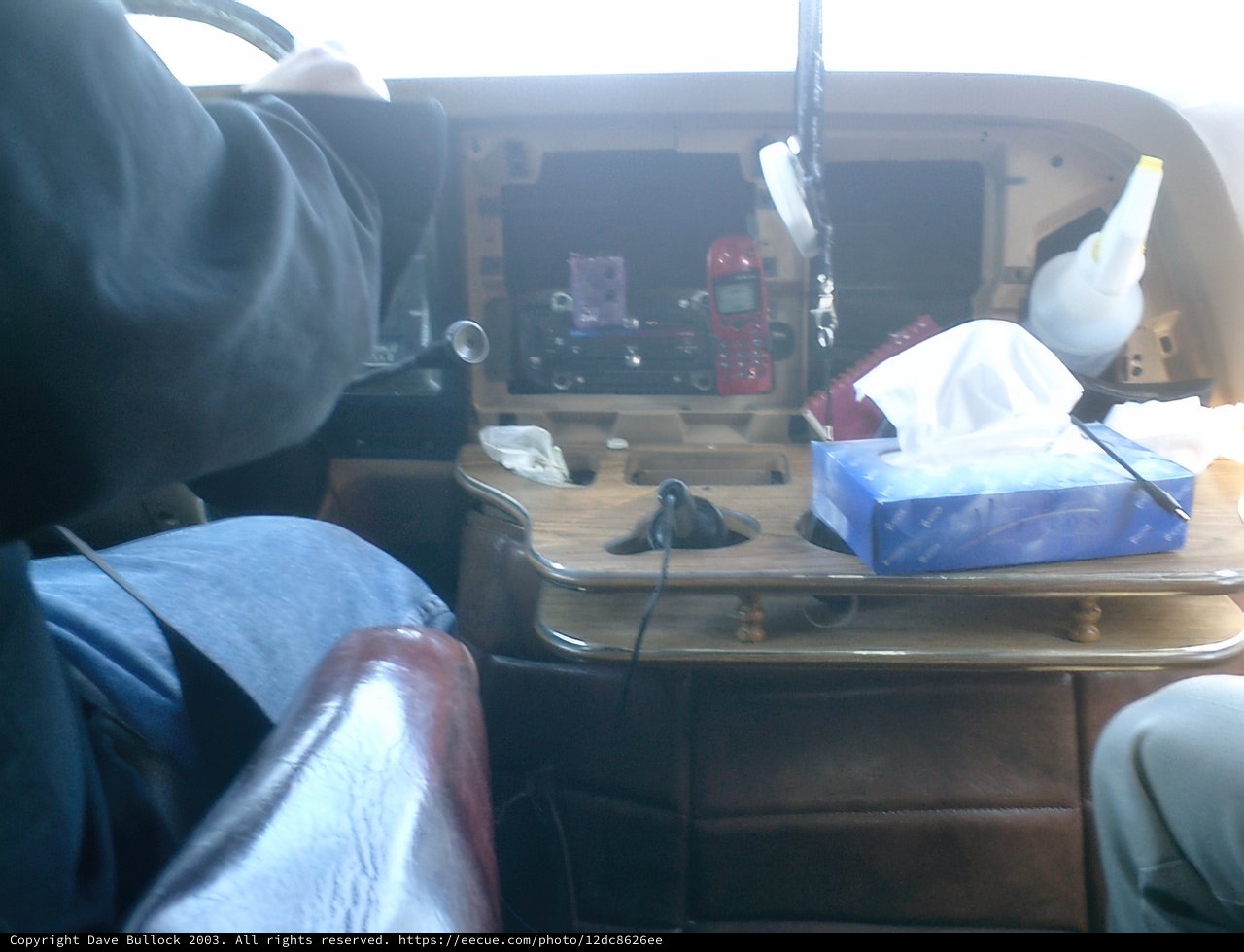 Tech-Savvy Man in his Vehicle