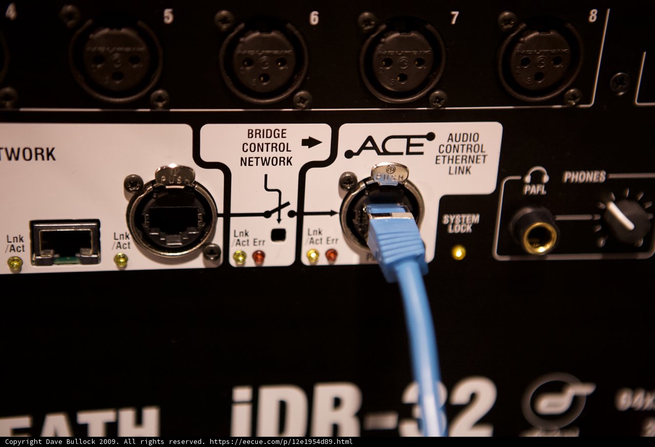 Blue Cord Plugged into Computer