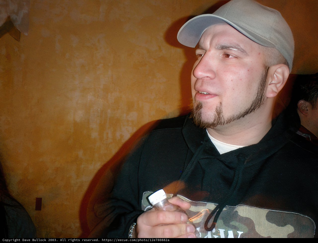 Hoodie, Hat, and a Phone