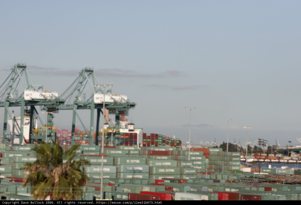 Majestic Shipping Vessel at the Busy Waterfront