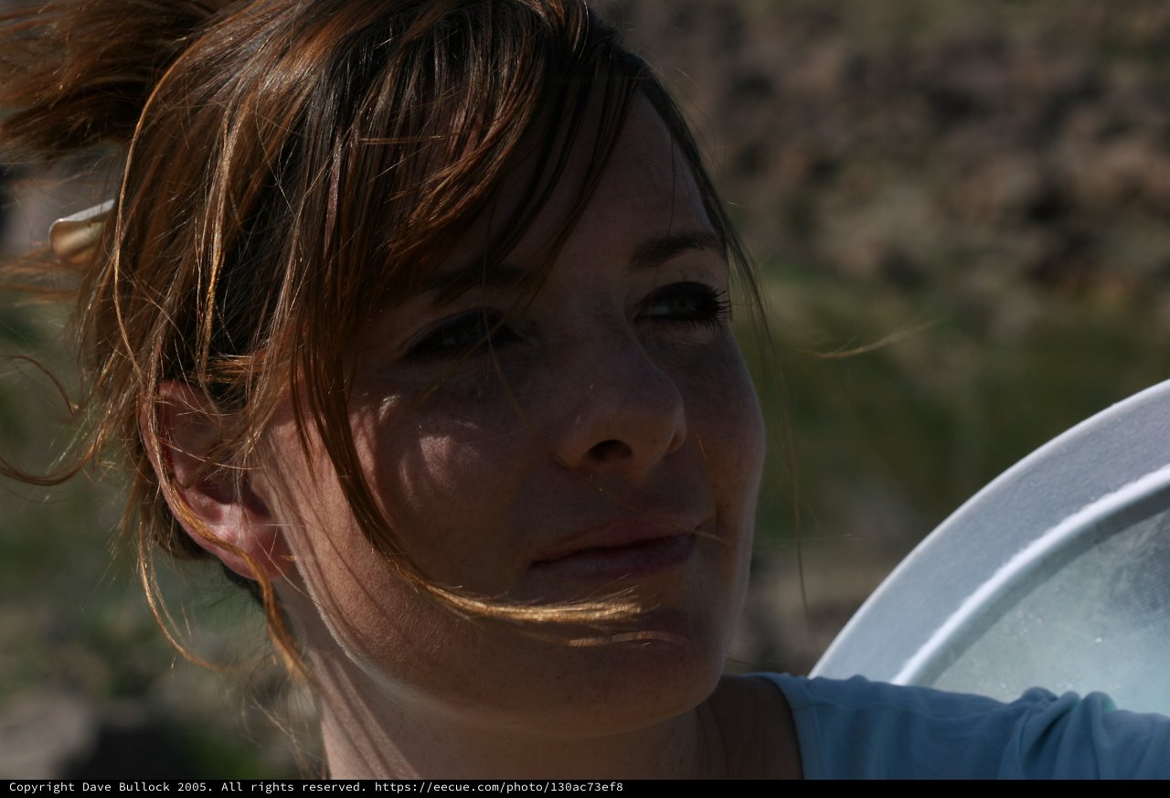 Wind-Swept Portrait in Desert Light