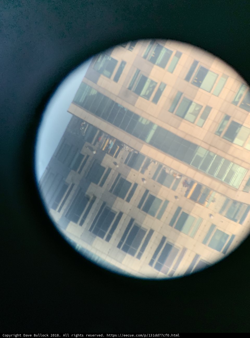 Reflections in a Porthole Mirror