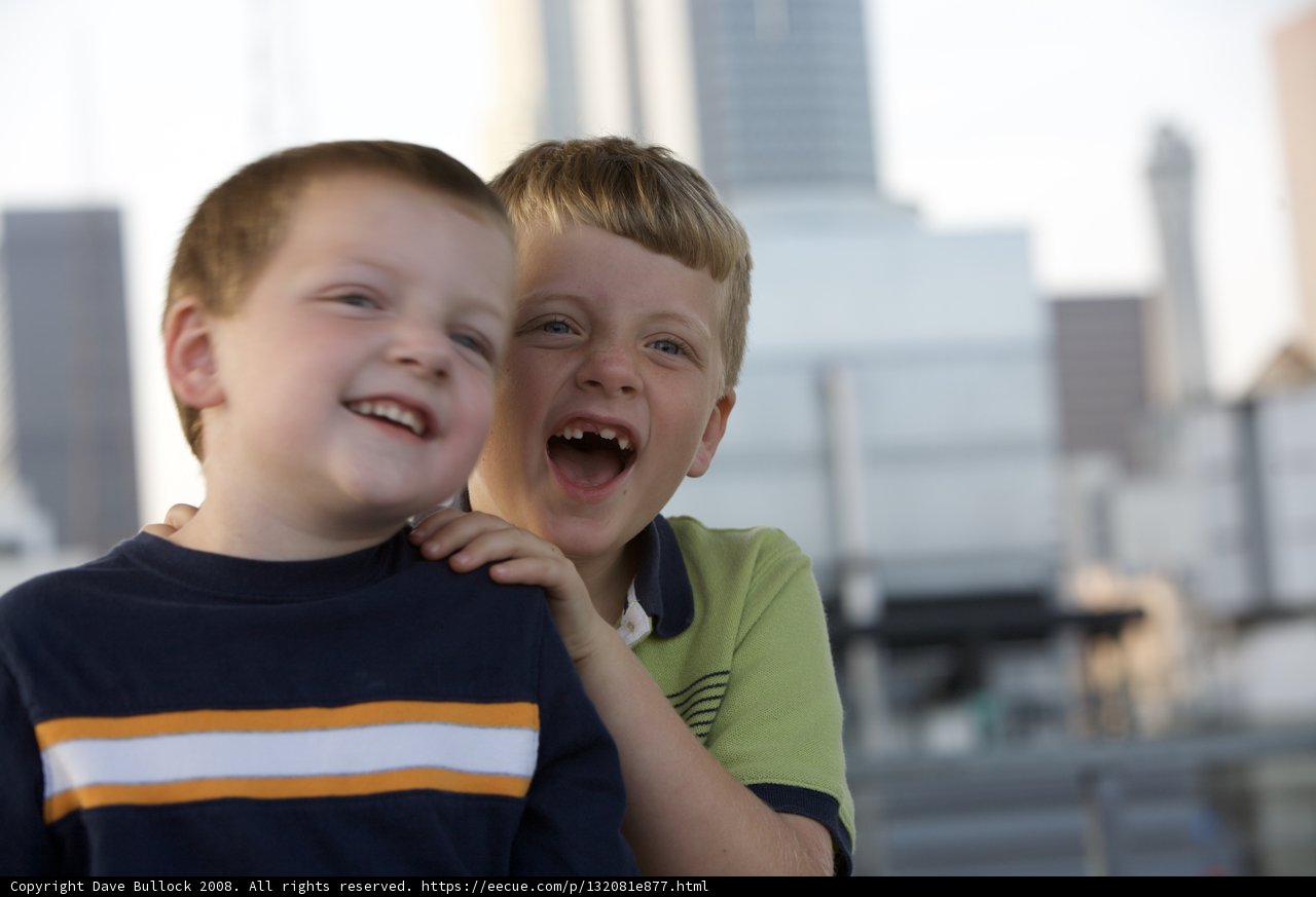Two Happy Boys with Wide Smiles