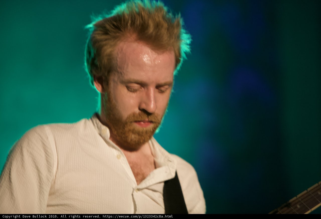 Guitarist with a White Shirt and a Beard