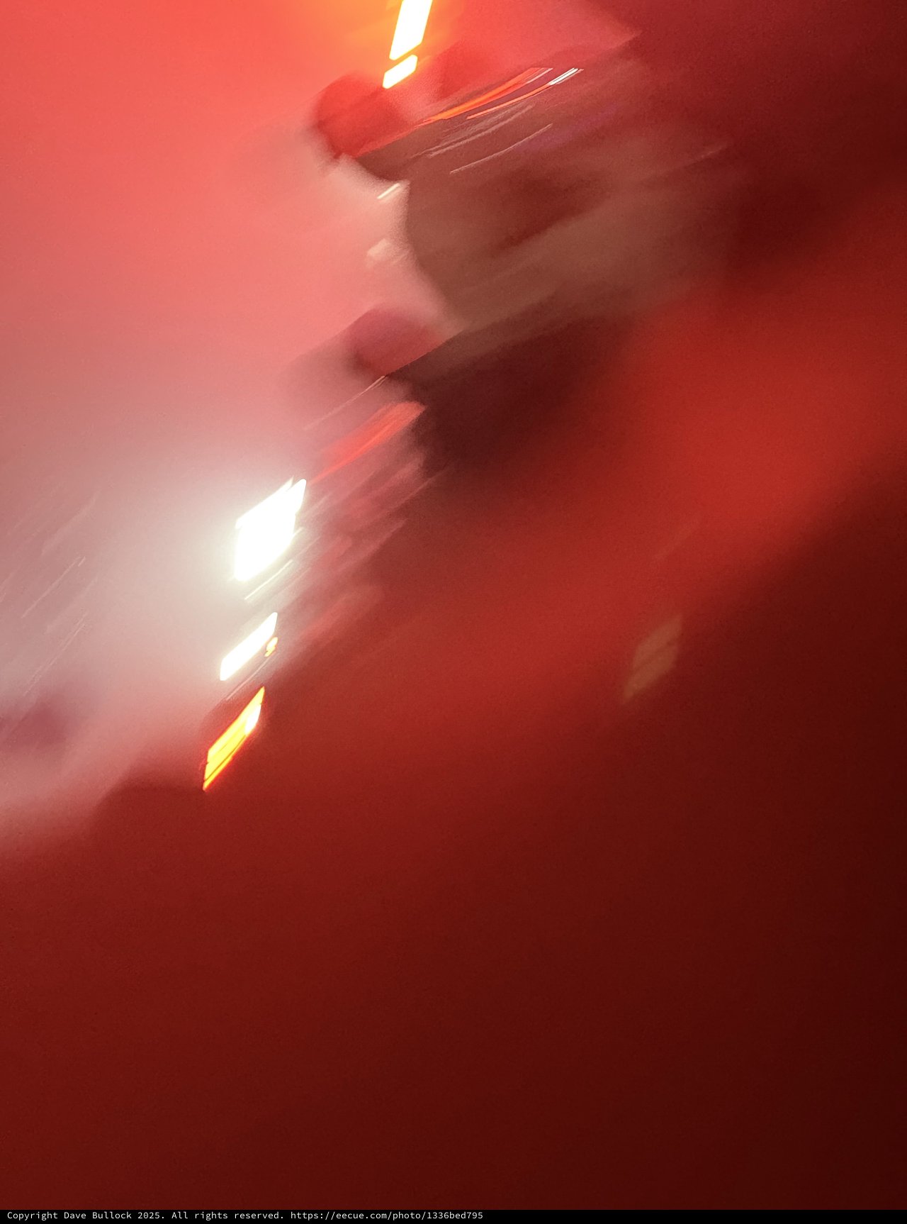 Motion Blur Silhouette in Red Concert Lighting