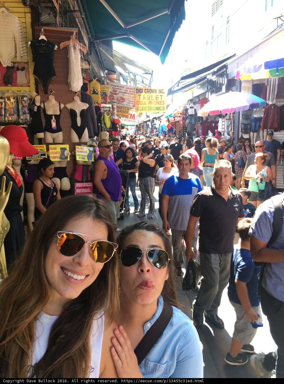 Stylish Women in a Busy Market
