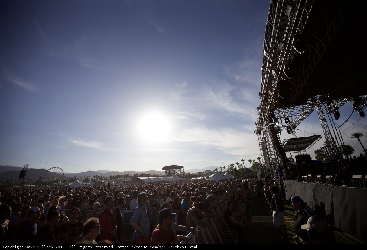 Coachella Crowd Cheers on Performer Under a Blue Sky