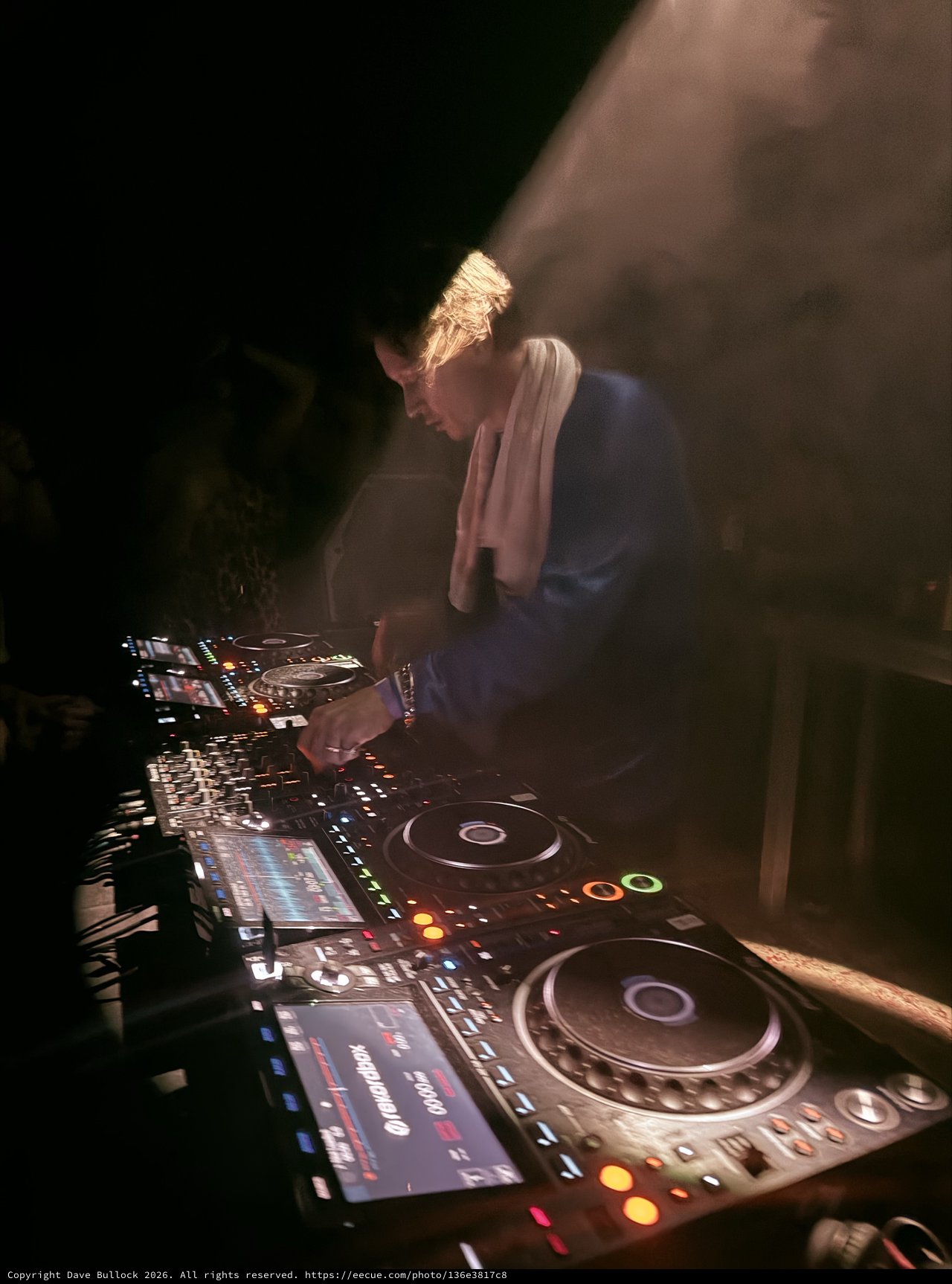 DJ Performance at London Nightclub with Professional Equipment