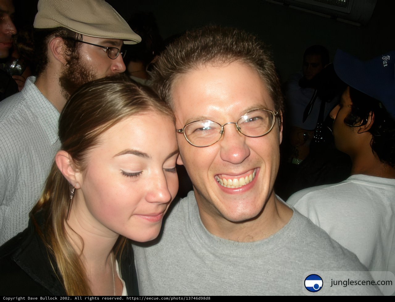 Smiling Couple in Baseball Caps