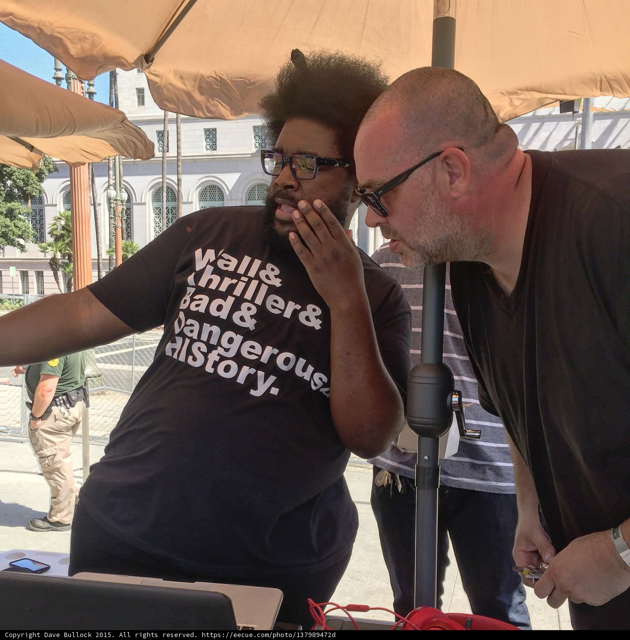 Questlove rocks the mic under his umbrella