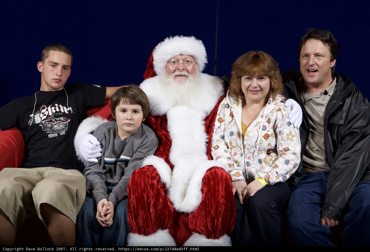 A Family Christmas Photo with Santa Claus
