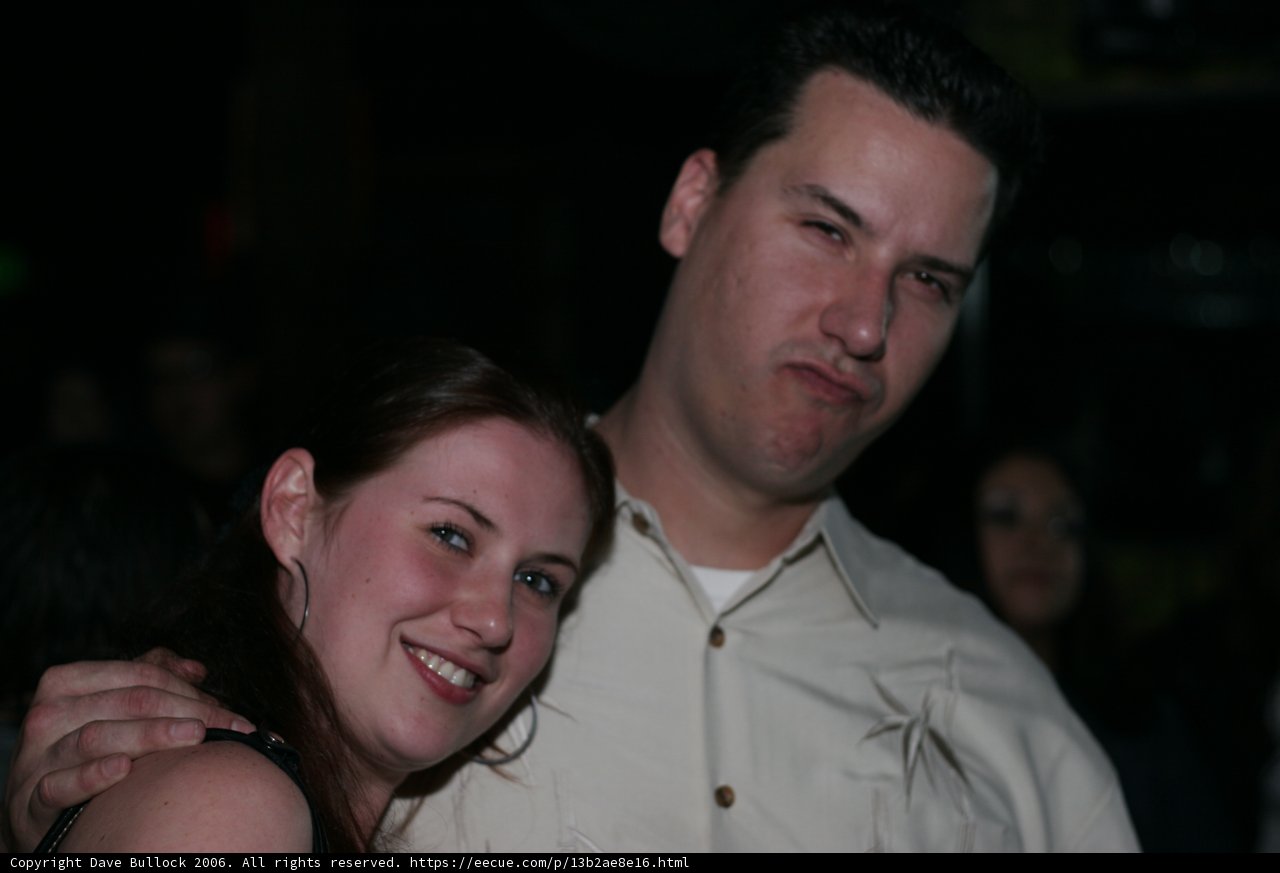 Couple Poses for Nightclub Portrait