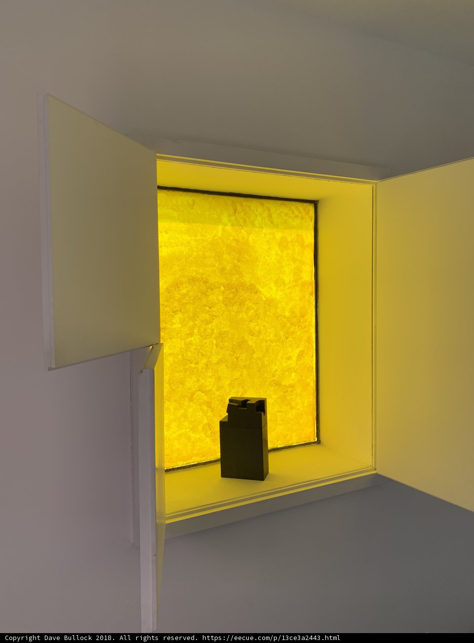 Yellow Window with a Mystery Object