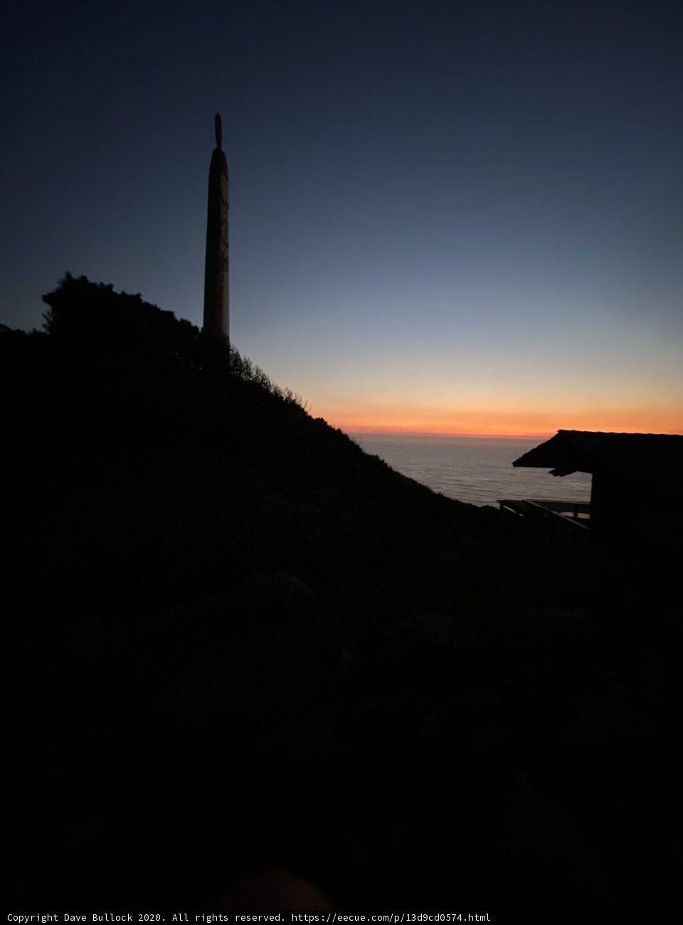 Towering Over the Sunset Sea