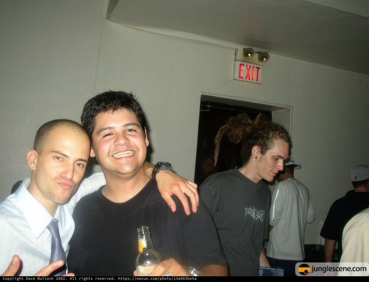 Two Men in Formal Wear Strike a Pose
