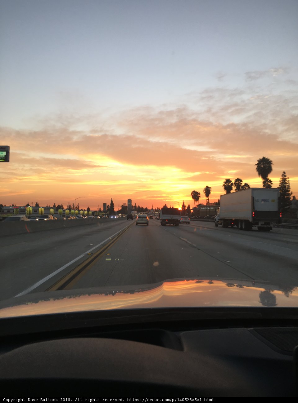 Driving towards the Sunset on the Freeway
