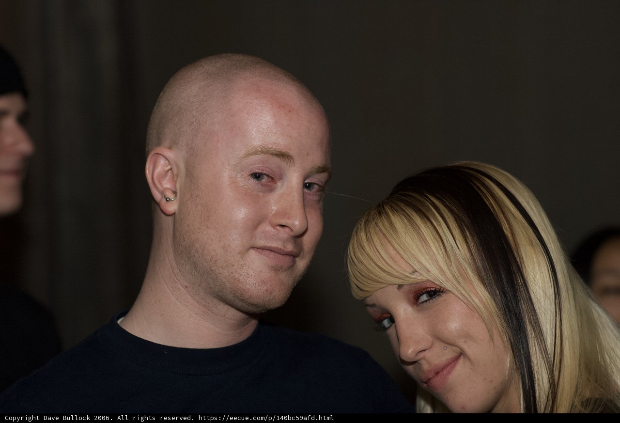 Funky Couple Poses for a Portrait