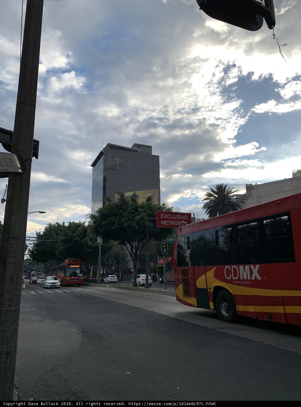 Red and Yellow Tour Bus in the City