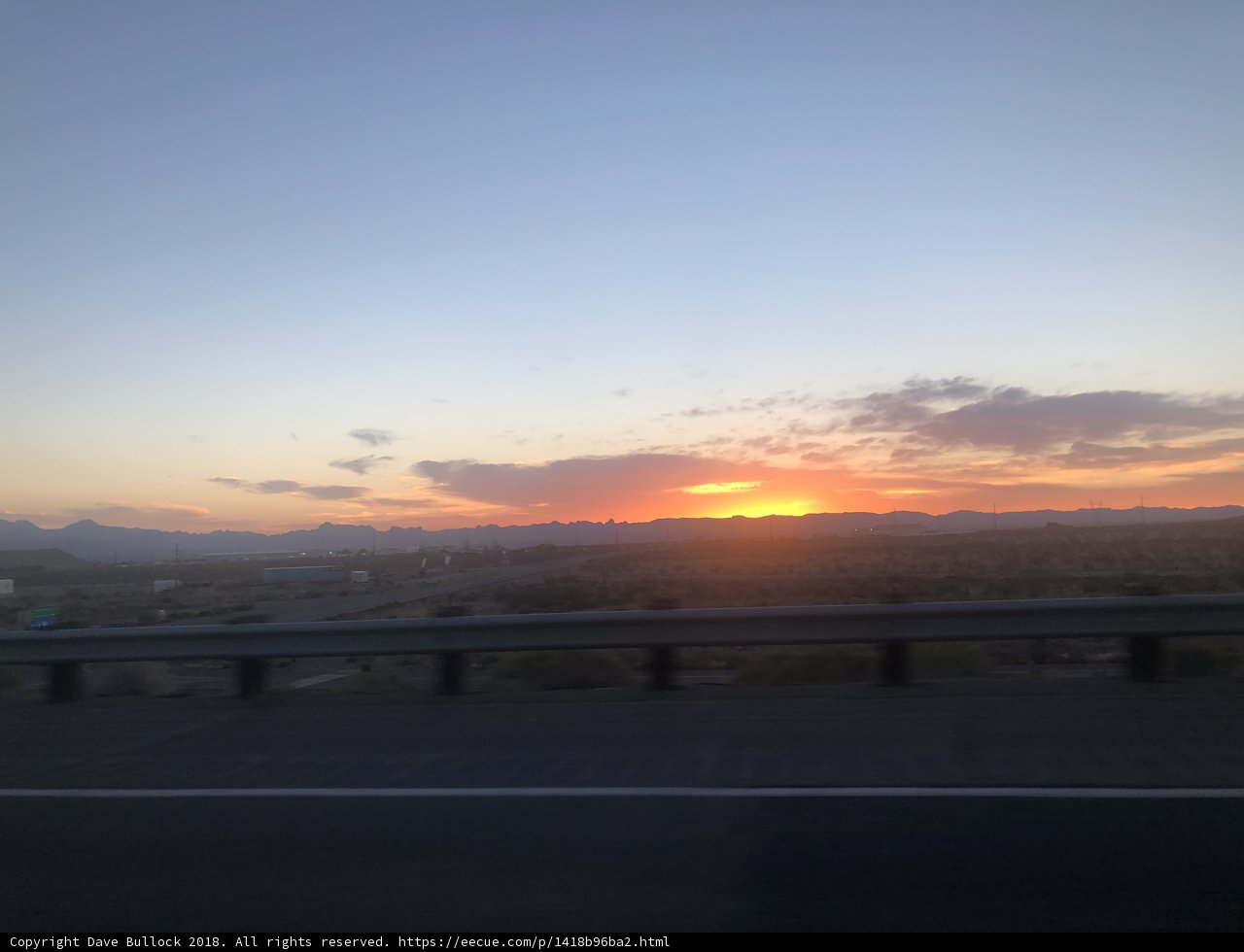 Majestic Sunset Over the Distant Mountains