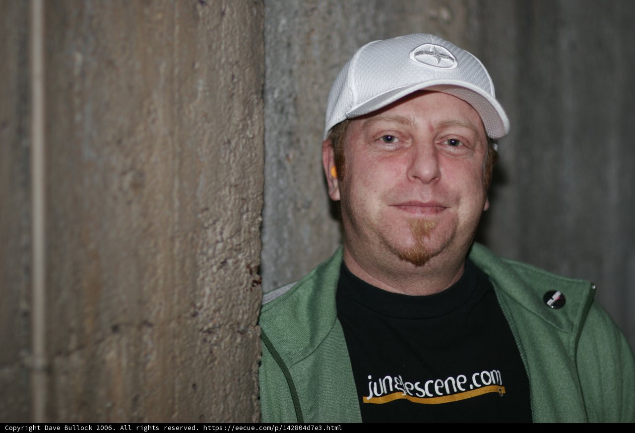 The Green Shirt and White Hat